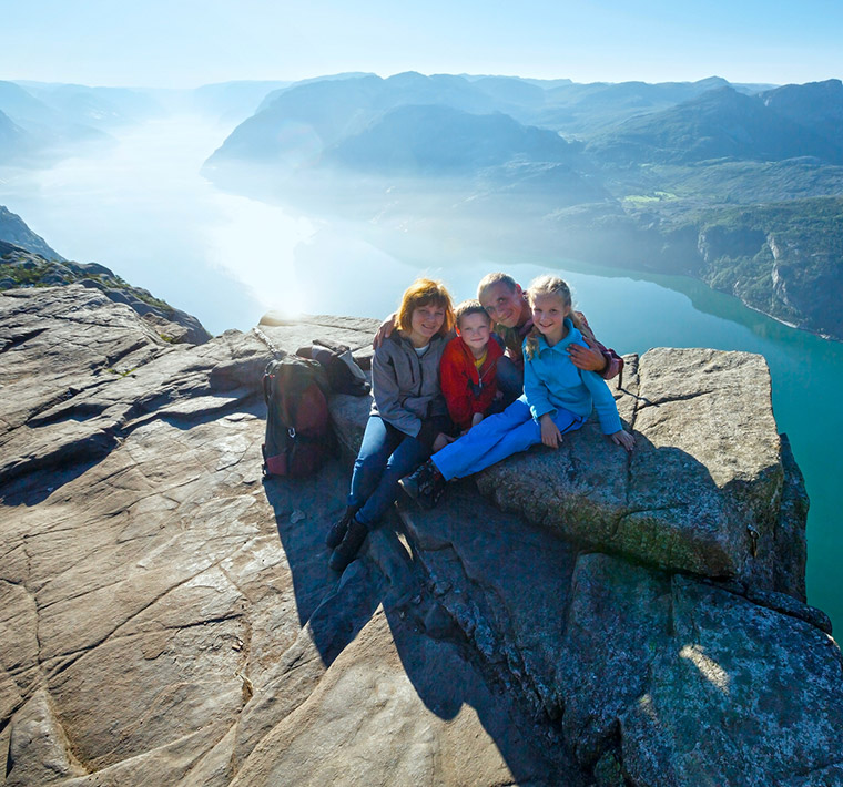 Norwegian family hiking at Preikestolen