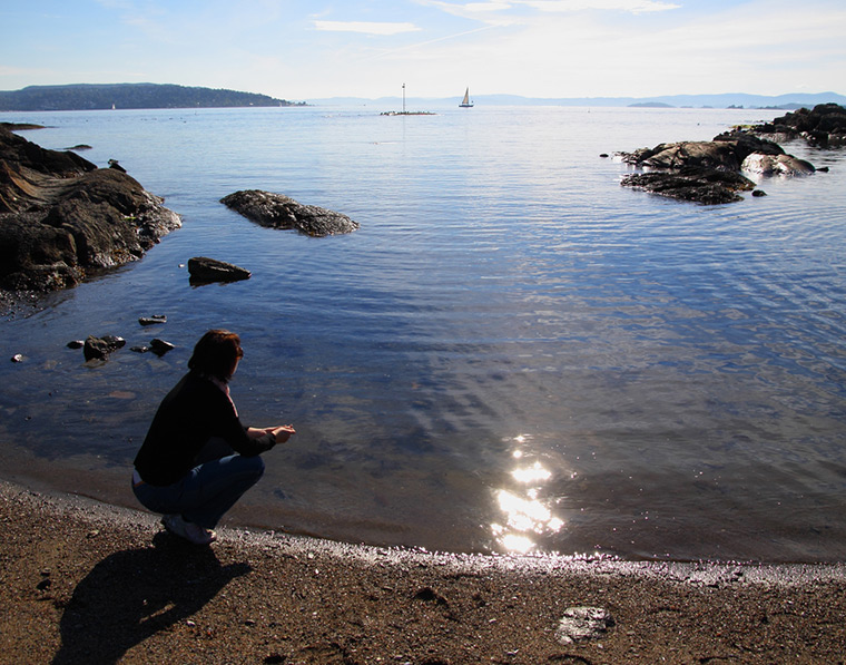 A person on a beach on Bygdøy, Oslo