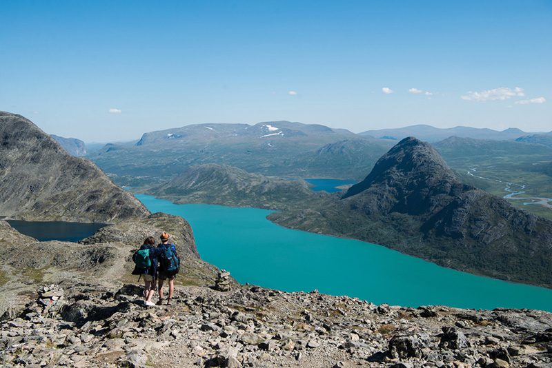 A couple hiking the Besseggen ridge in central Norway