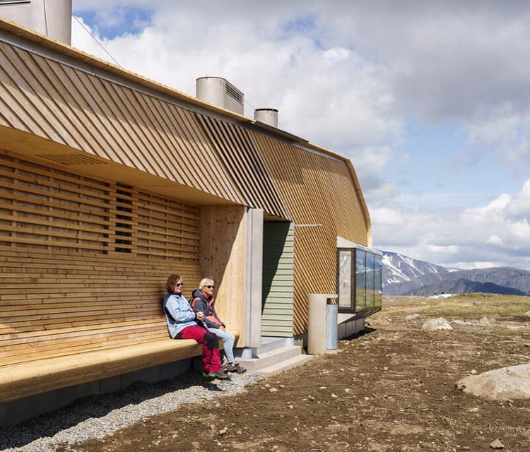 A couple take a break at the Flye 1389 cafe cabin in Norway