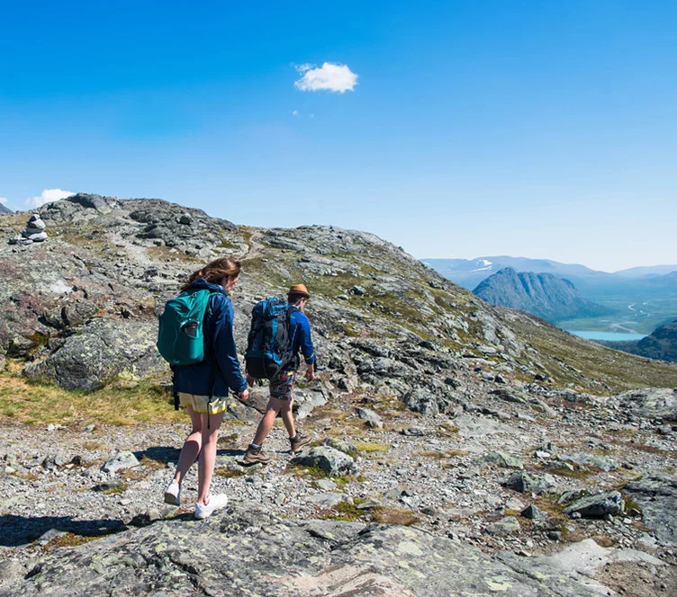 Norwegian hikers on the Besseggen ridge in Jotunheimen National Park, Norway