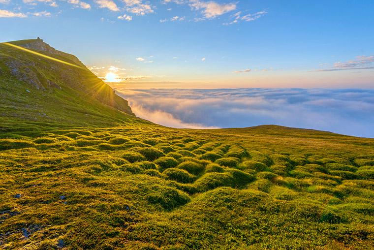 Midnight sun over Sorøya island near Hammerfest in northern Norway