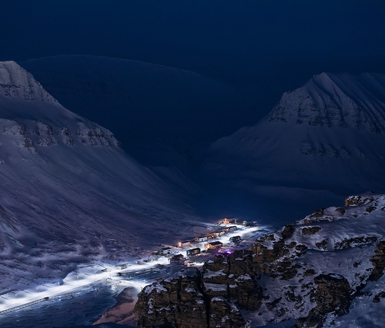 Nybyen on the outskirts of Longyearbyen, Svalbard, in blue light