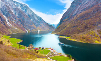 A boat sails on the Nærøyfjord in western Norway