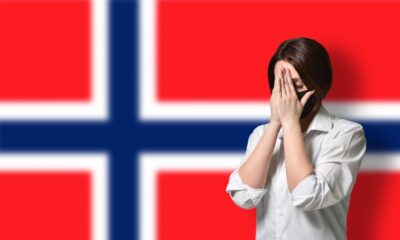 Coronavirus patient in front of the flag of Norway