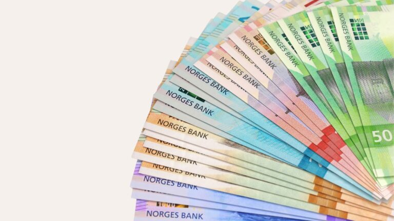 Fan of Norwegian krone banknotes.