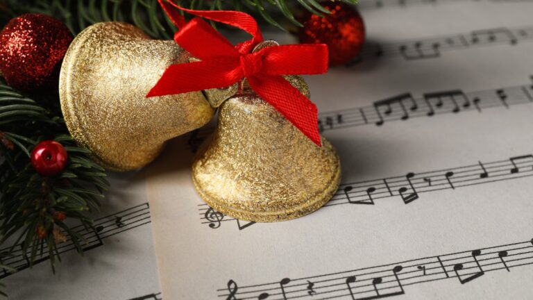 Christmas bells and sheet music.