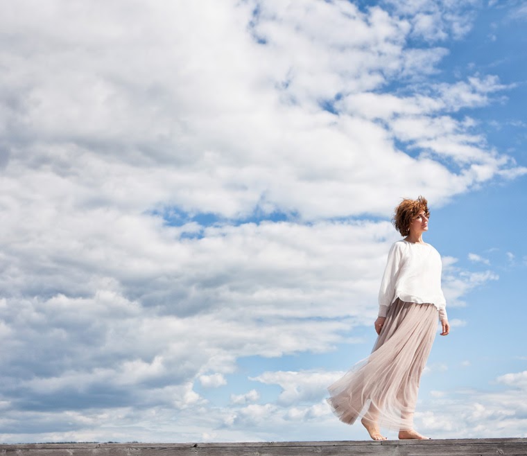 sissel against clouds