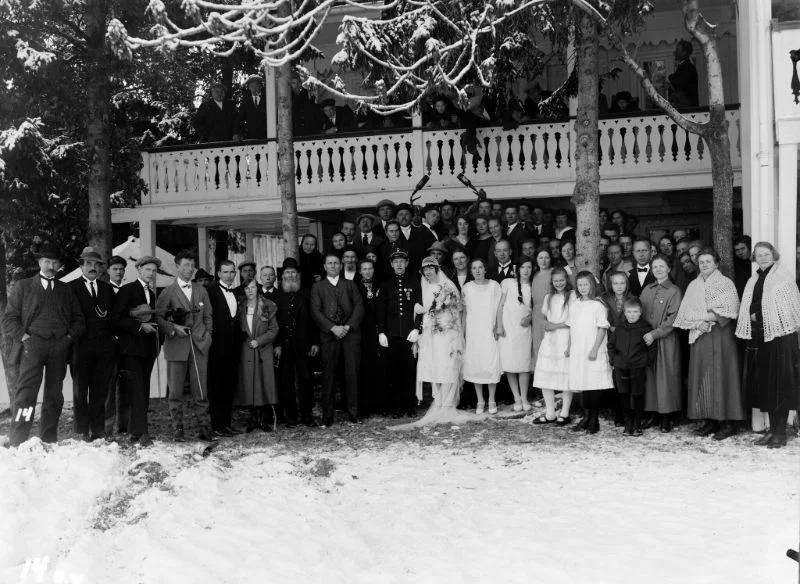 A historic photograph of a wedding group in fjord Norway