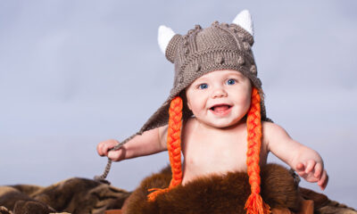Norwegian baby dressed up as a Viking.