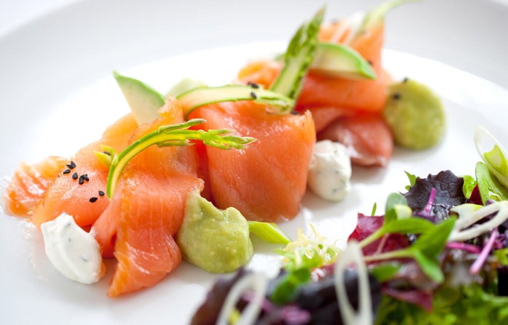 Norwegian salmon on a plate with garnish