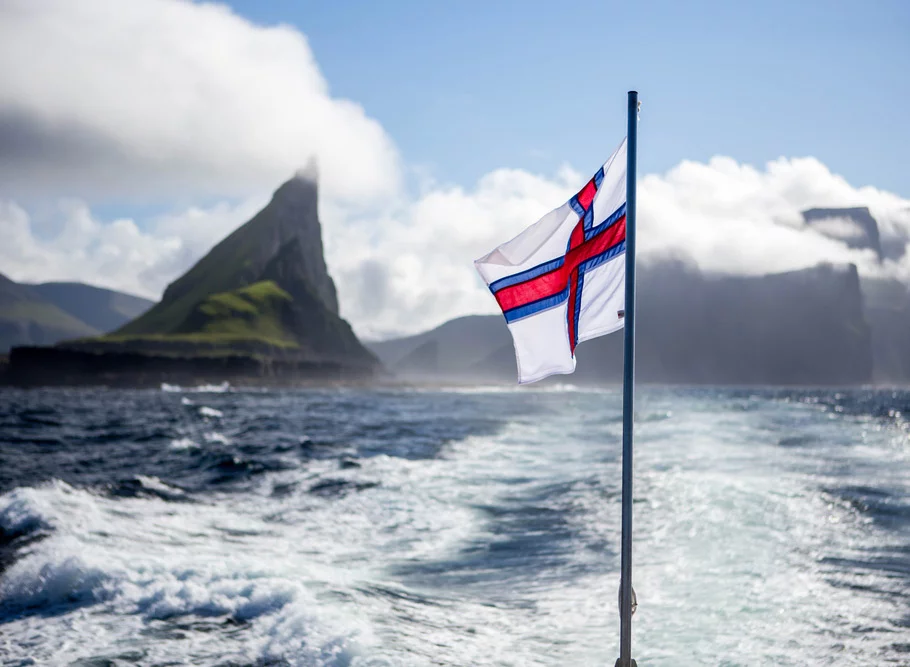 The landscape and flag of the Faroe Islands