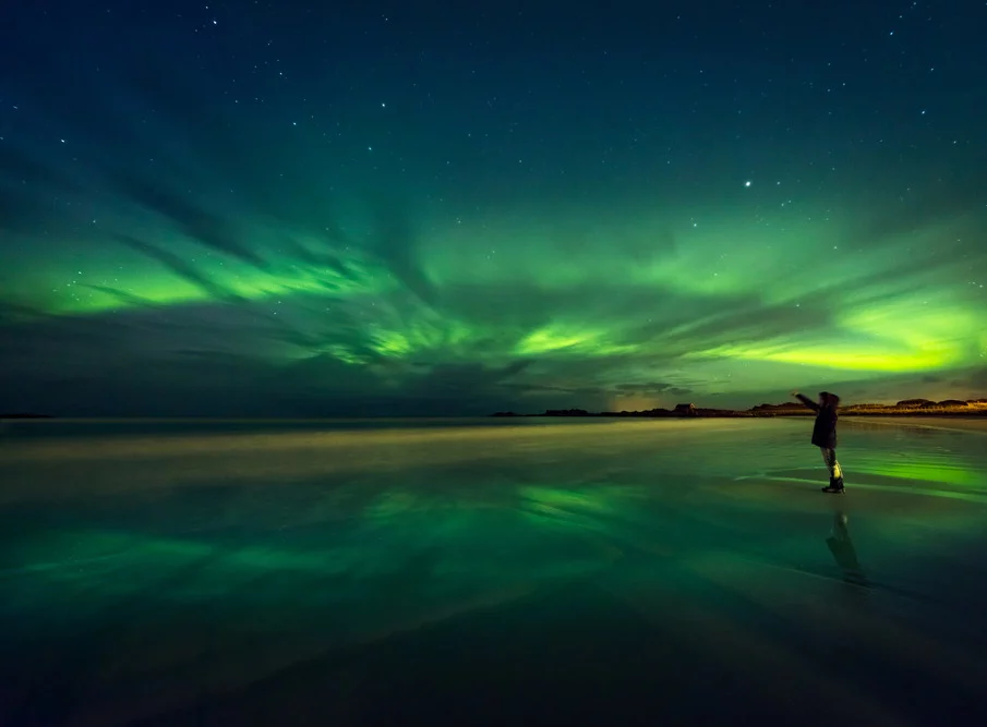 Northern lights photographer in Scandinavia.