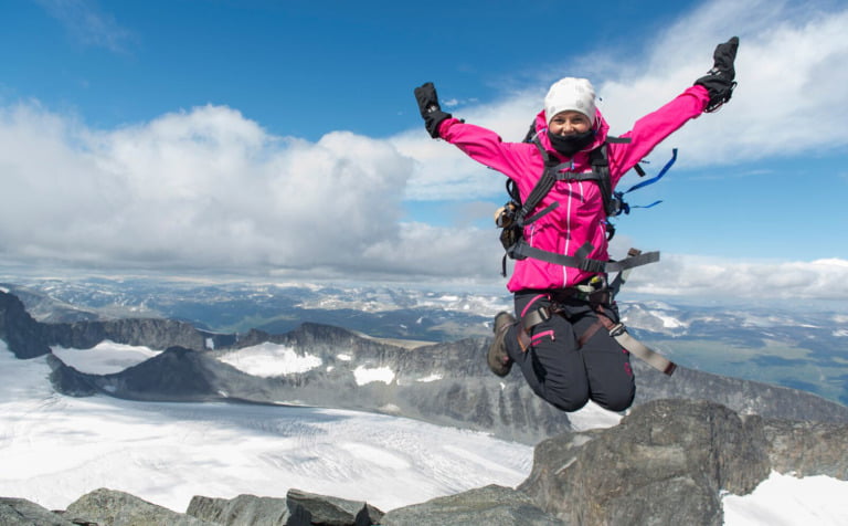 A happy hiker on the Norwegian mountains.