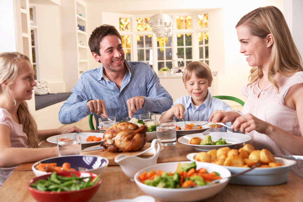 A Norwegian family eating dinner together.