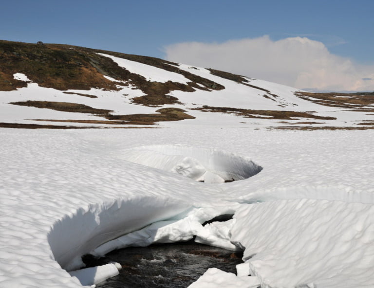 Snowmelt on the Hardangervidda mountain plateau in Norway