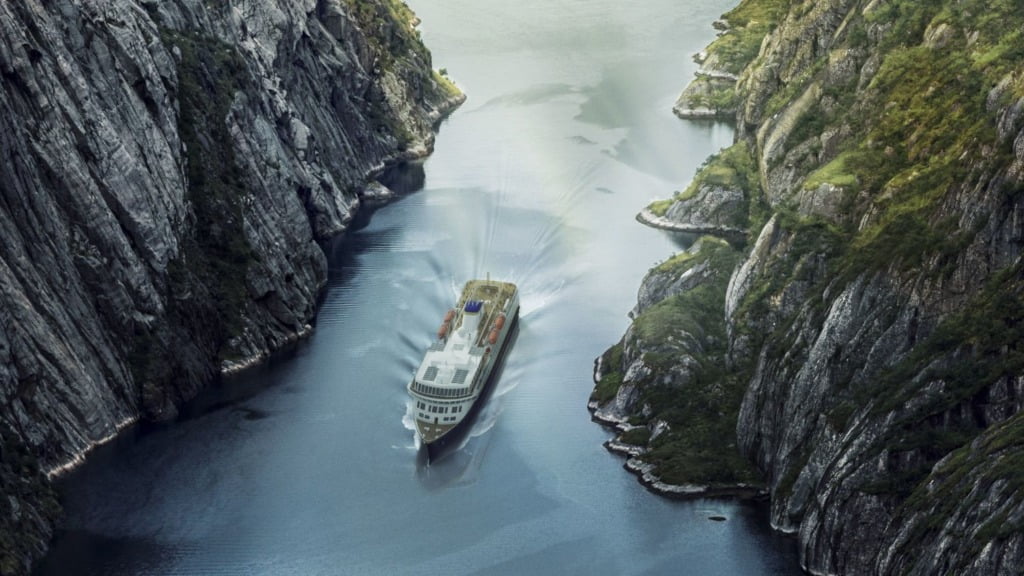 Havila Kystruten vessel in a Norwegian fjord