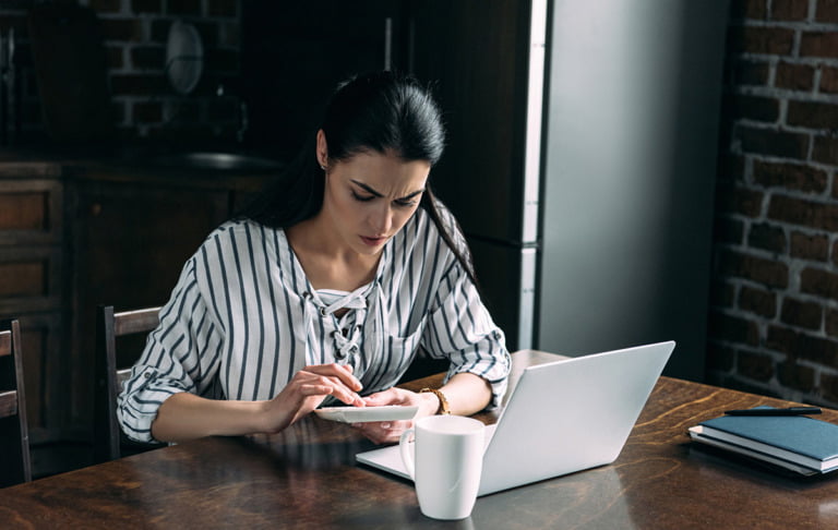 A female entrepreneur in Norway working on her tax return.