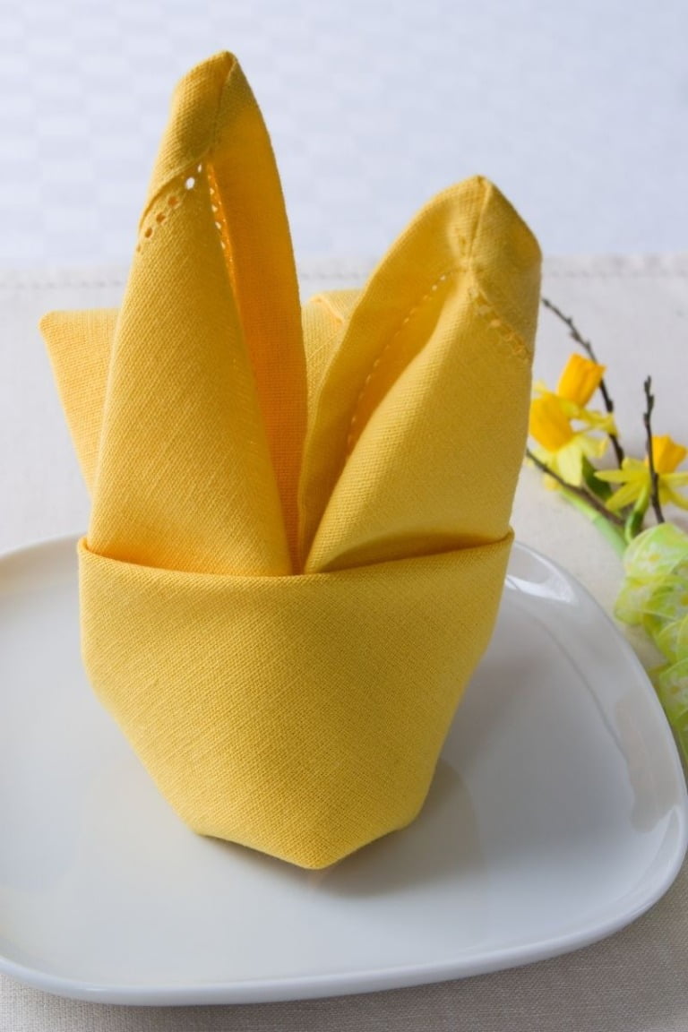 A yellow easter themed napkin