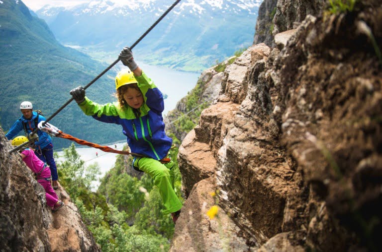 A family mountain climb in Loen, Norway