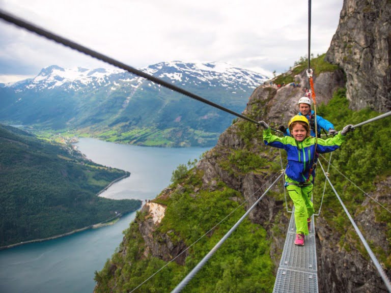 A family enjoying the spectacular mountains around Loen, Norway