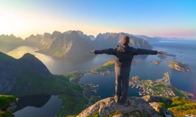 Norwegian citizen looking at Lofoten Islands