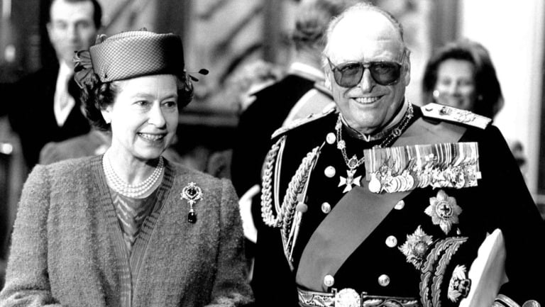 The Queen welcoming Norway's King Olav to Windsor Castle for a state visit.