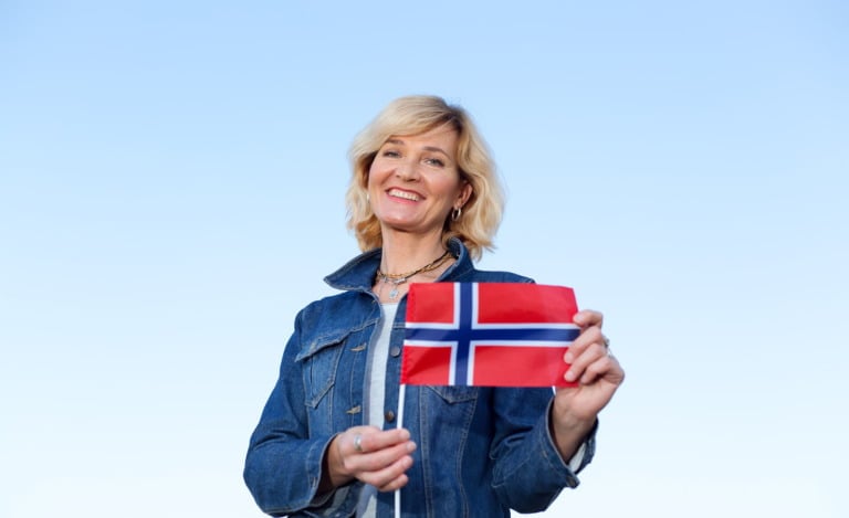 Norwegian language exam student with the flag of Norway