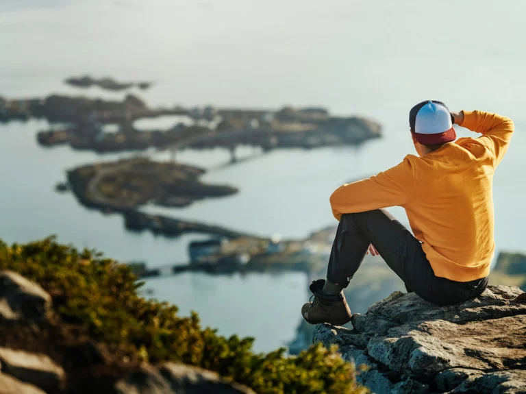 Tourist hiker in Norway's Lofoten islands