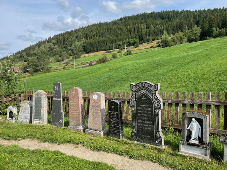 Gravestones in the graveyard of Hegge stave church