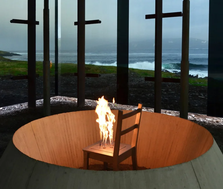 Burning chair pin the Steilneset memorial