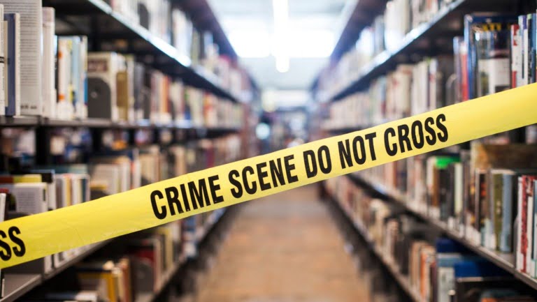 Crime books with crime scene tape