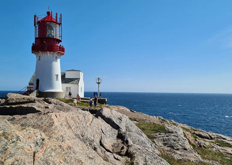 Tourists at Lindesnes lighthouse in Southern Norway