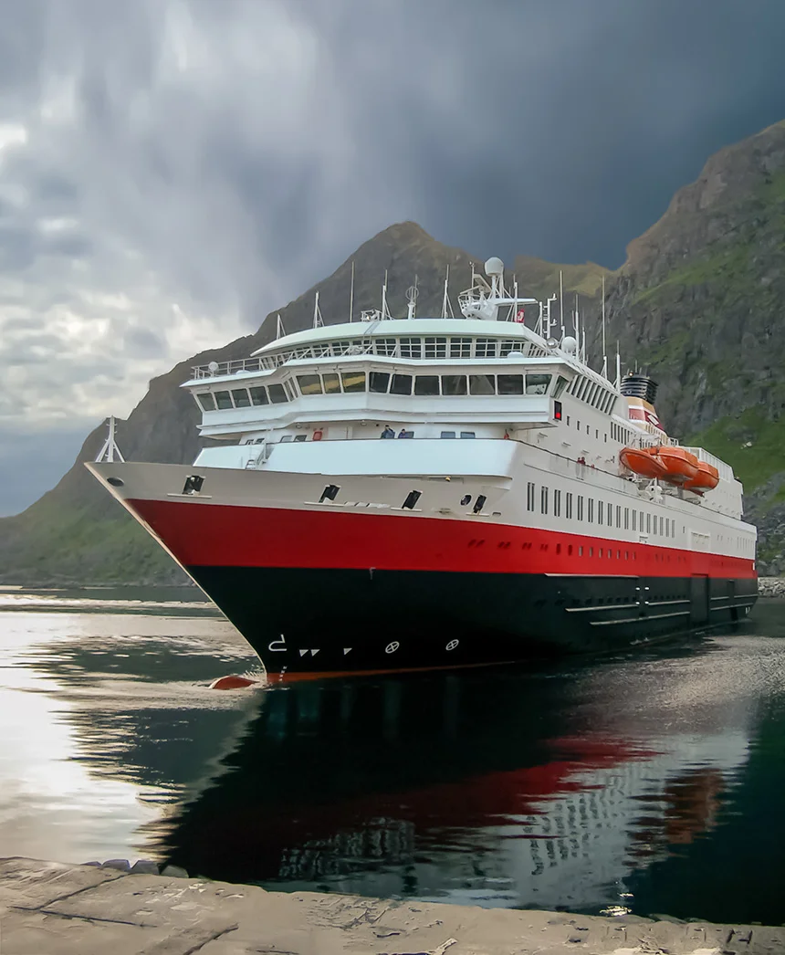 Hurtigruten vessel sailing into Stamsund port, Norway