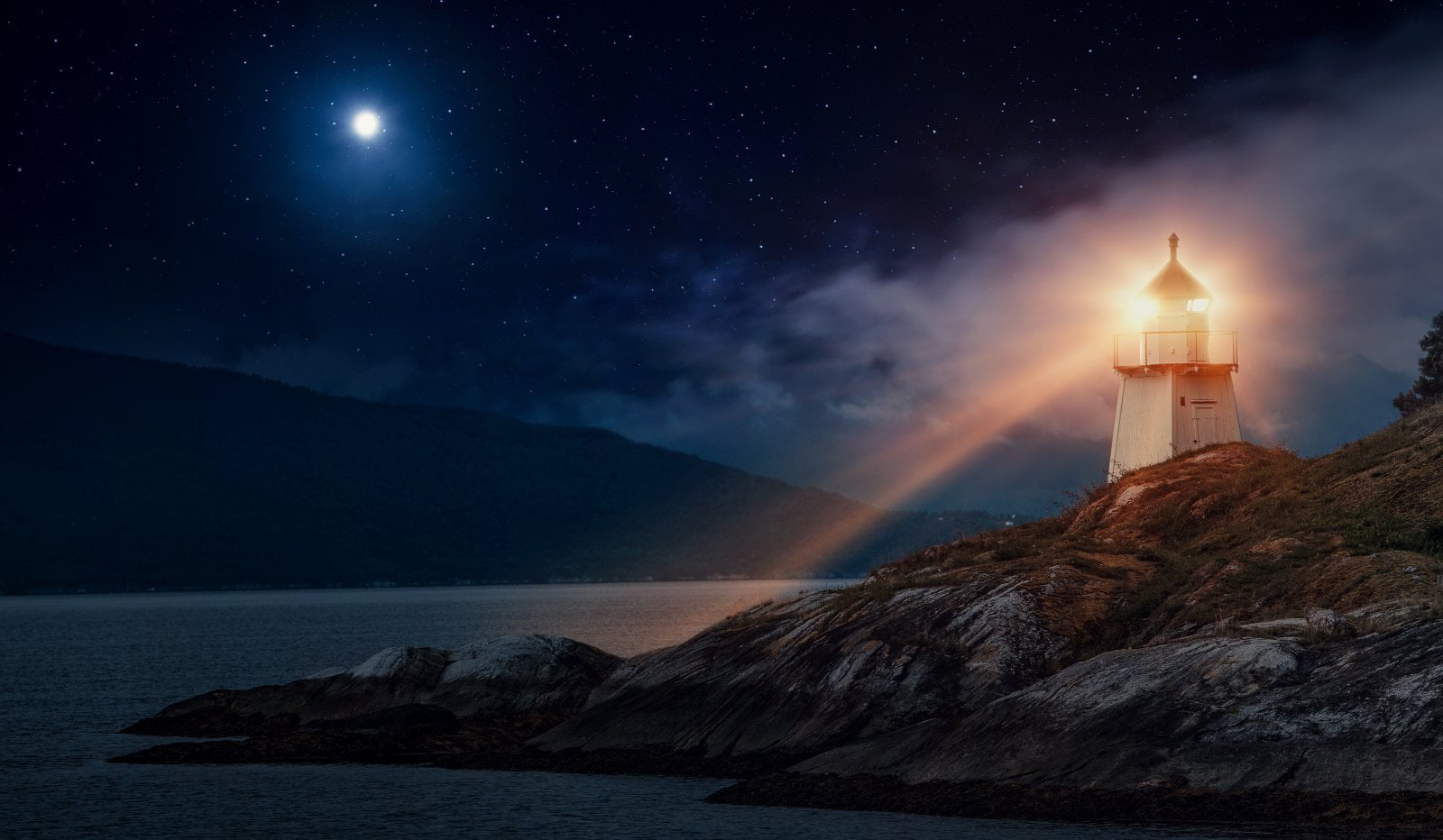 A lighthouse in Norway at night on the Norwegian coastline