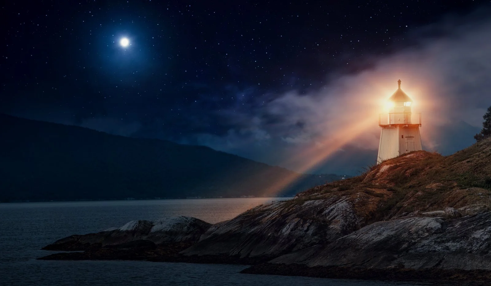 A lighthouse in Norway at night on the Norwegian coastline