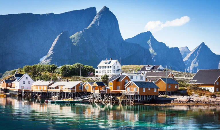 Yellow houses on the Lofoten islands coastline in Northern Norway