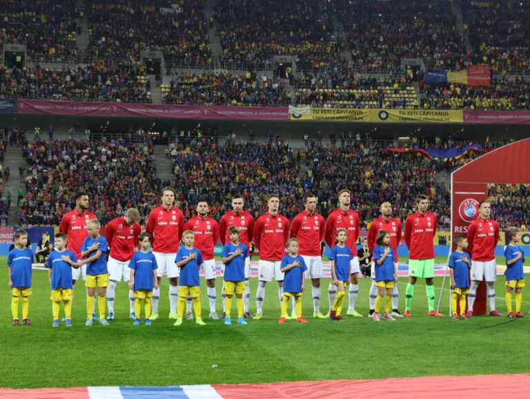 Norway national football team stand for the national song