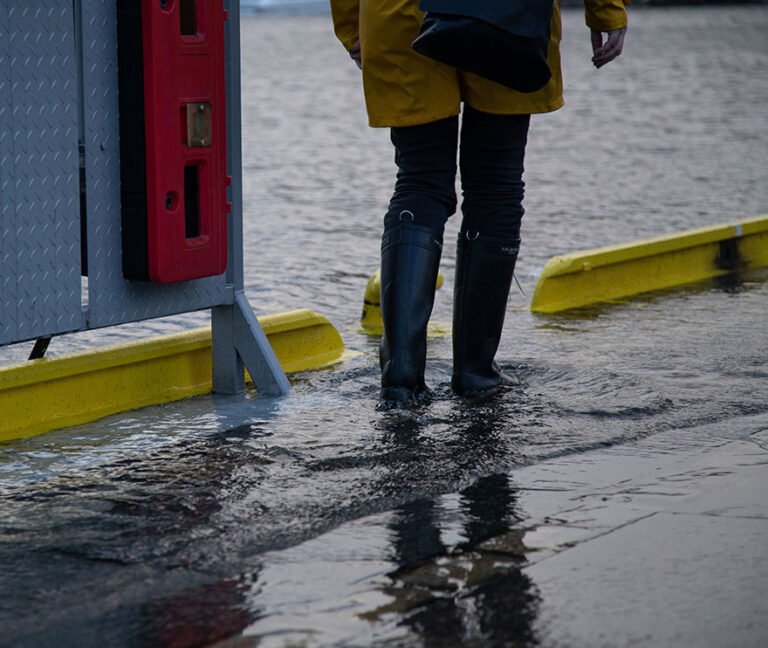 Walking through rain in Bergen, Norway