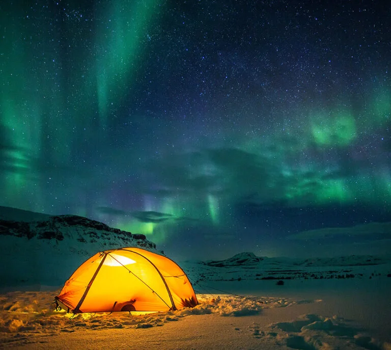 Northern lights camping in Scandinavia.