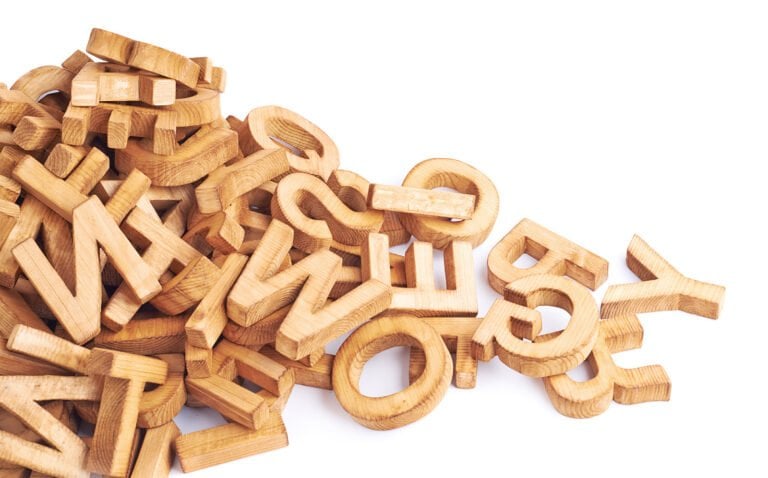 Wooden Norwegian letters in a pile