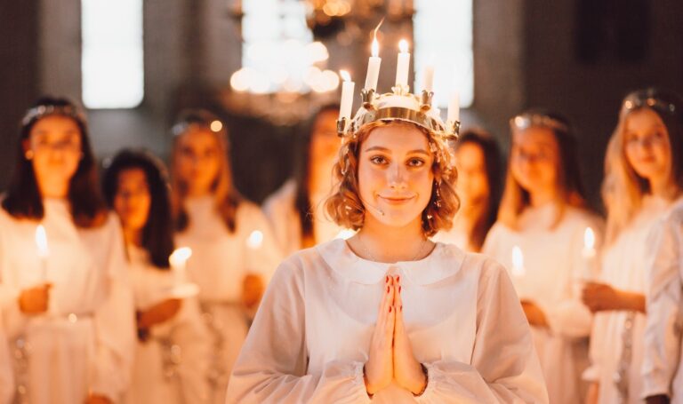 Saint Lucy's Day (Saint Lucia's Day) choir celebrates the coming of Christmas in Sweden. Photo: Jon Buscall / Shutterstock.com.