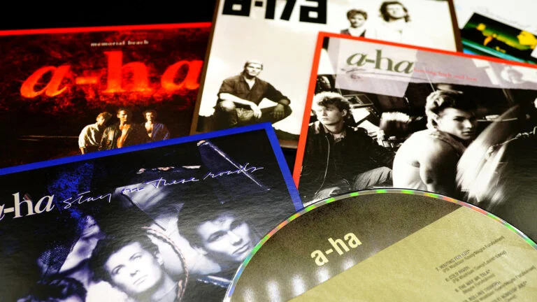 Artwork from various A-ha music releases over the years. Photo: Kraft74 / Shutterstock.com.