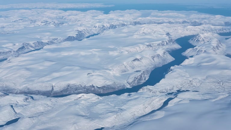 Greenland land mass from a plane window