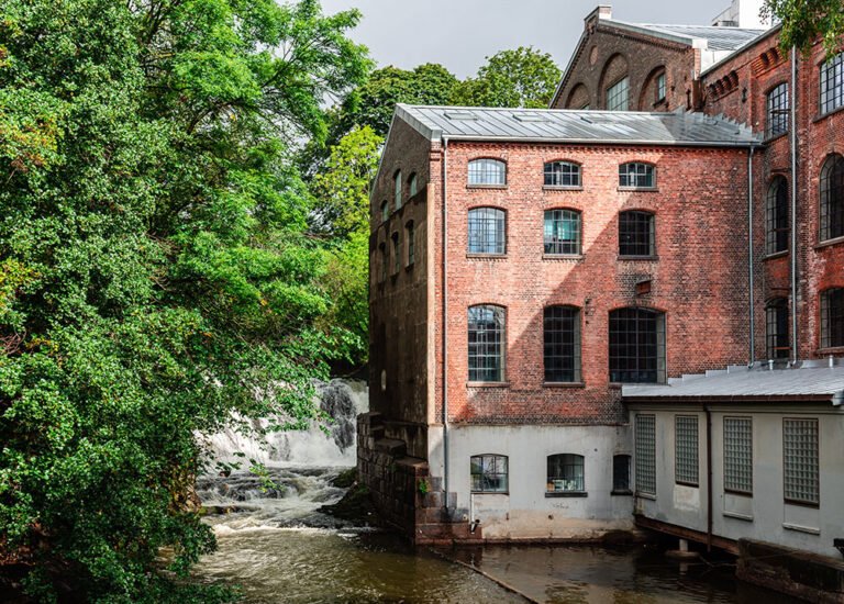 Old industrial buildings lining the Akerselva river.