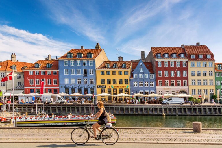 A cyclist in Copenhagen, Denmark. Photo: Nikolay Antonov / Shutterstock.com.