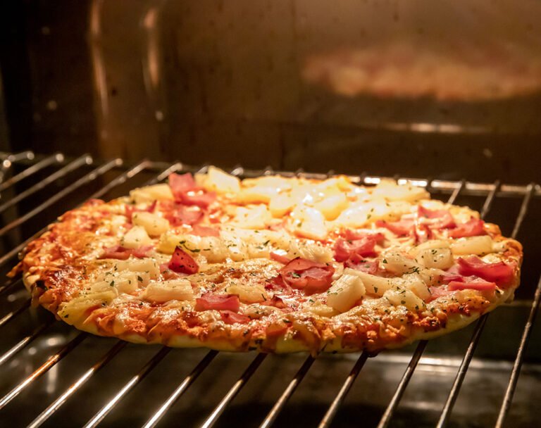 Frozen pizza in a Norwegian oven.
