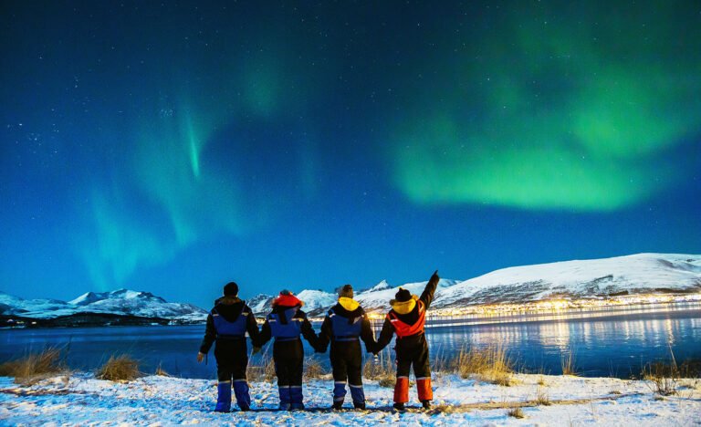 Scandinavian people watching the northern lights 