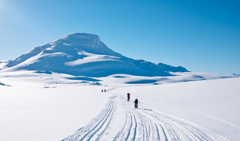 Skiers in an avalanche risk area in Norway.