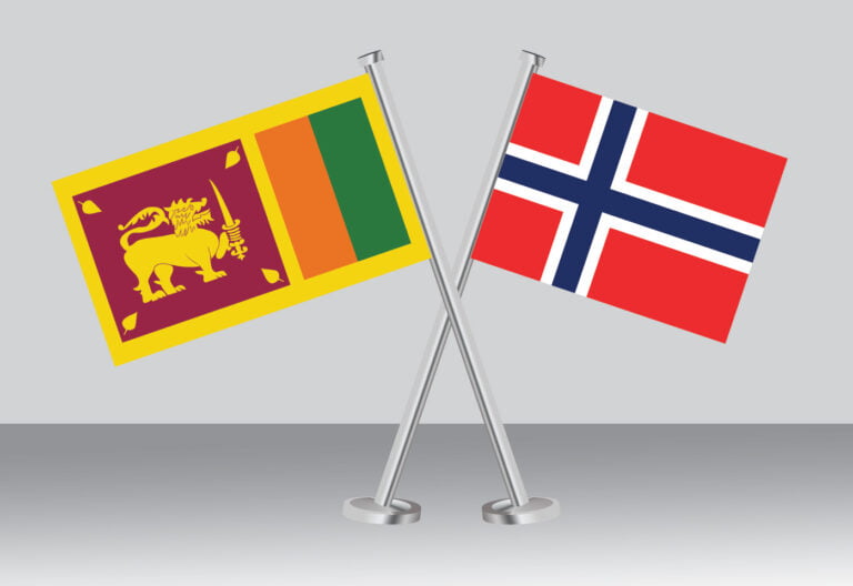 Sri Lanka and Norway desk flags.